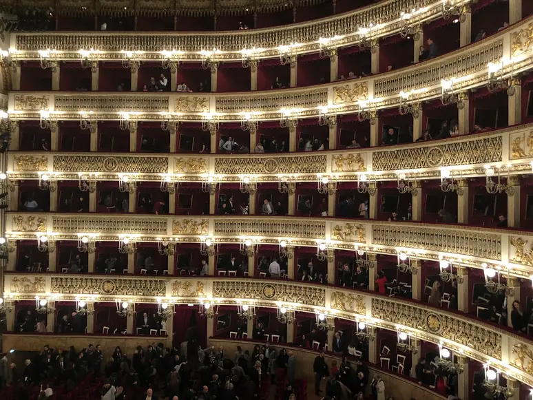 Theatre balconies with gold decorations and red velvet